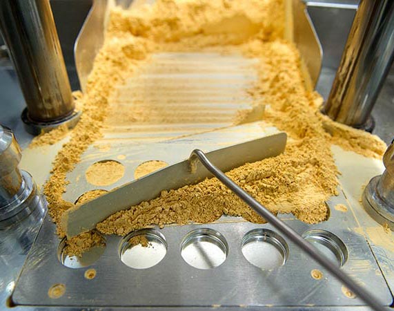 COMPATTATURA POLVERI COSMETICHE